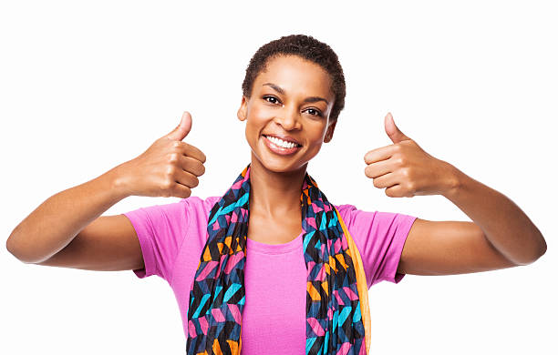 Portrait of a casual African American female giving a double thumbs up. Horizontal shot. Isolated on white.